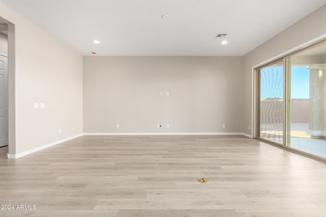 empty room with light wood-type flooring