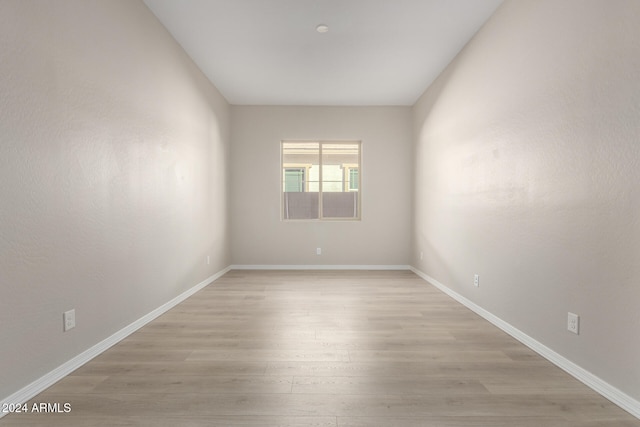 unfurnished room featuring light wood-type flooring