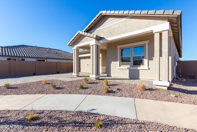 view of front of home featuring a garage