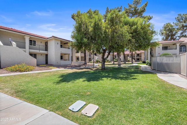 10610 S 48th St Unit 1096, Phoenix, AZ 85044 - view of property's community with a lawn