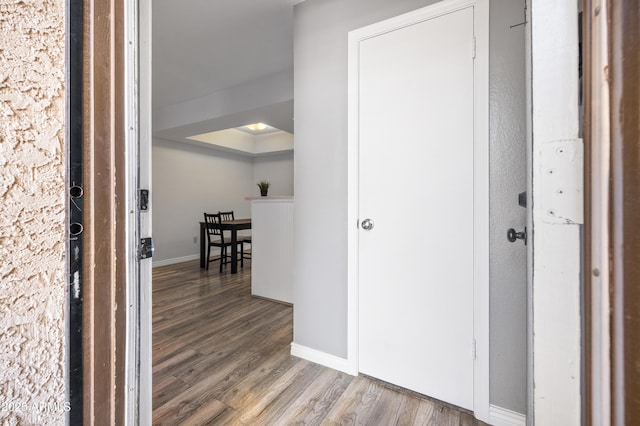 10610 S 48th St Unit 1096, Phoenix, AZ 85044 - corridor with wood finished floors and baseboards