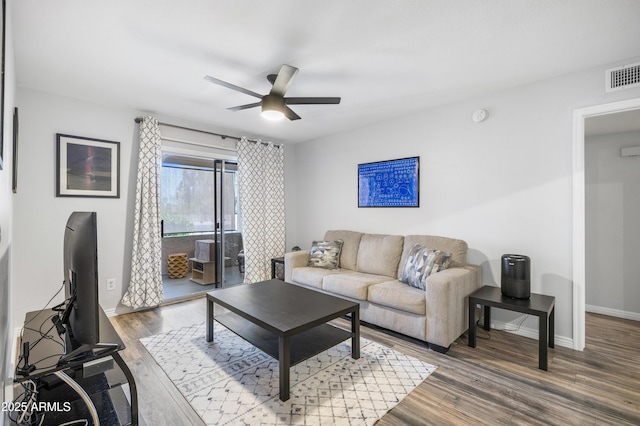 10610 S 48th St Unit 1096, Phoenix, AZ 85044 - living room featuring ceiling fan and wood finished floors