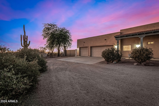 view of front of property with a garage