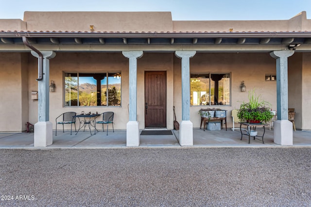 entrance to property with covered porch