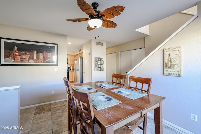 dining space with ceiling fan