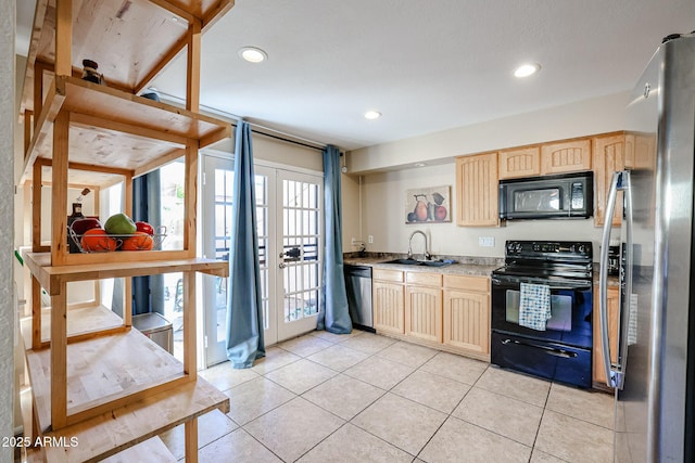 kitchen with black appliances, light brown cabinets, light tile patterned floors, and sink