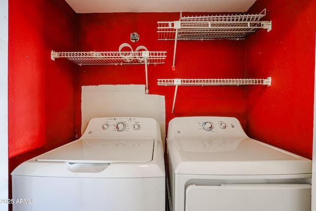 laundry area featuring washer and clothes dryer