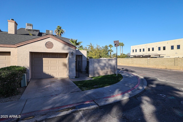 exterior space with a garage