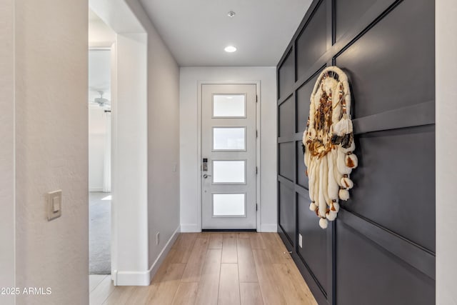 doorway with light hardwood / wood-style floors