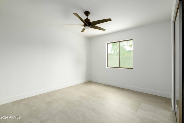 unfurnished room featuring ceiling fan