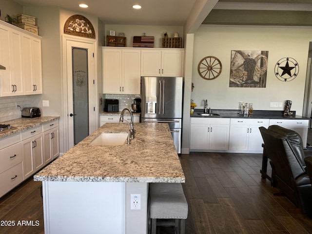 4114 Copperhead Dr, Wickenburg, AZ 85390 - kitchen featuring stainless steel refrigerator with ice dispenser, a sink, dark wood finished floors, recessed lighting, and backsplash