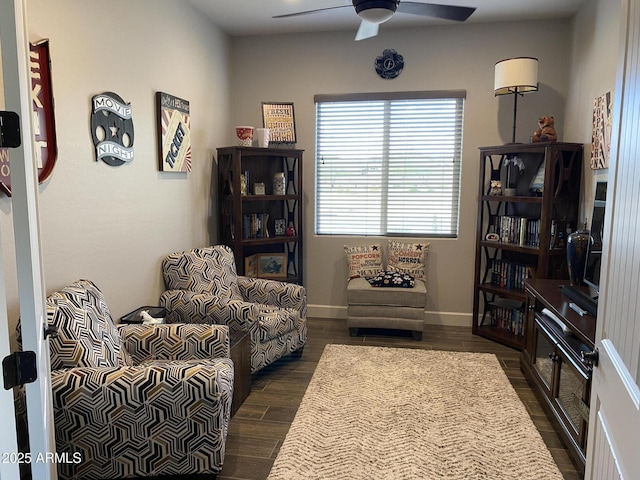 4114 Copperhead Dr, Wickenburg, AZ 85390 - living area with ceiling fan, dark wood-style flooring, and baseboards