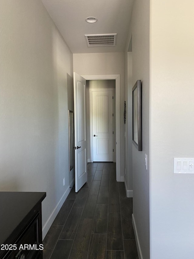 4114 Copperhead Dr, Wickenburg, AZ 85390 - hallway featuring baseboards and wood tiled floors