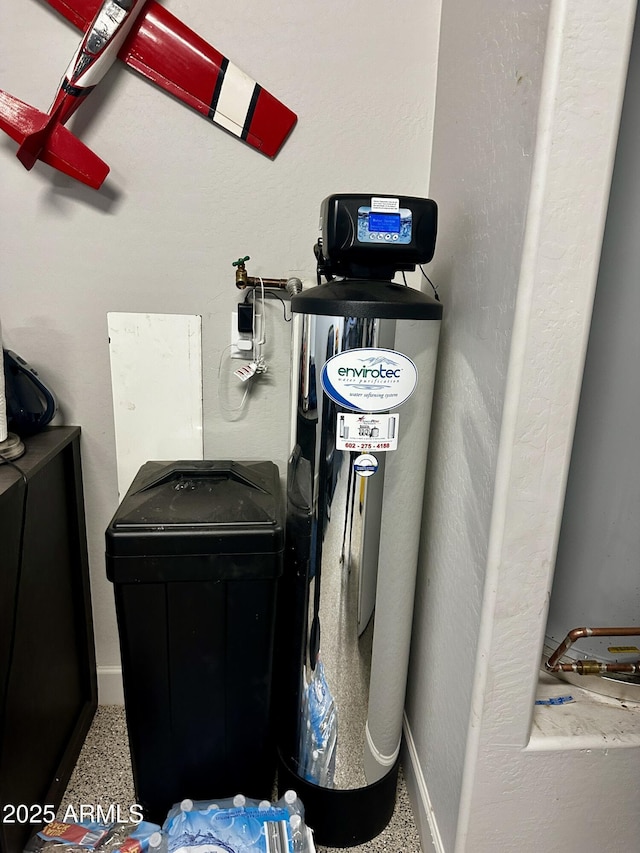 4114 Copperhead Dr, Wickenburg, AZ 85390 - detailed view of a water softener and baseboards