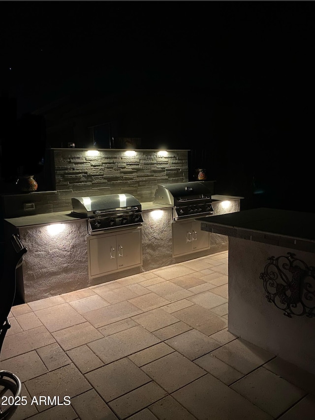 4114 Copperhead Dr, Wickenburg, AZ 85390 - patio at twilight featuring a patio