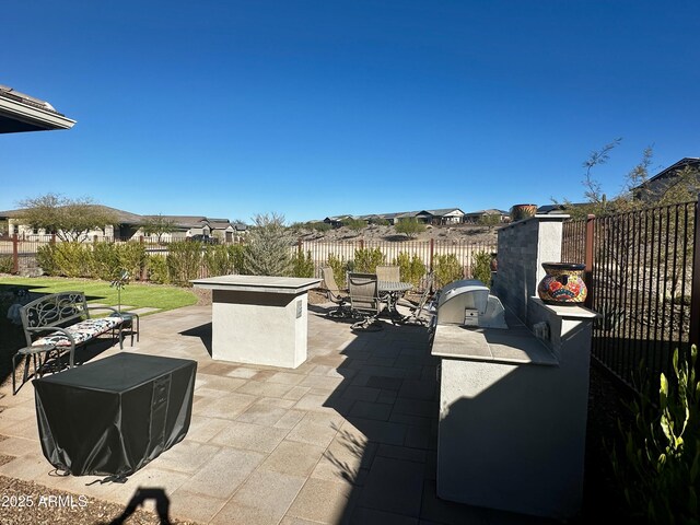 4114 Copperhead Dr, Wickenburg, AZ 85390 - view of patio / terrace with an outdoor kitchen and outdoor dining space