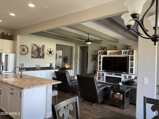4114 Copperhead Dr, Wickenburg, AZ 85390 - living room featuring recessed lighting, wood finish floors, beam ceiling, and ceiling fan