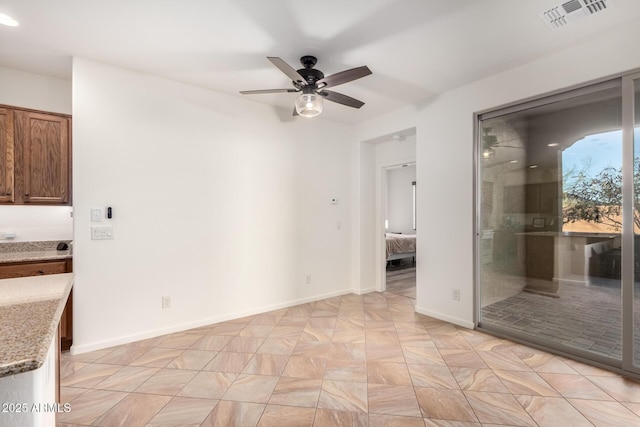 empty room with ceiling fan