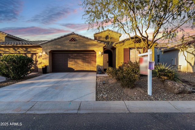 ranch-style home with a garage