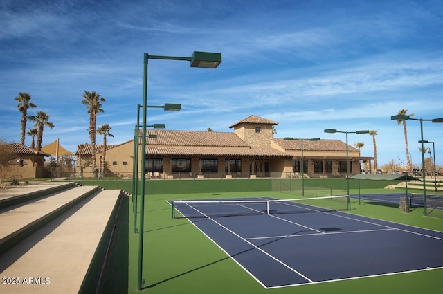 view of sport court featuring basketball hoop