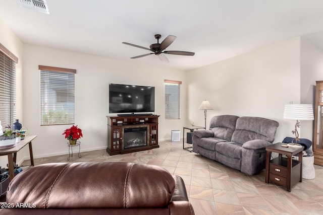 living room with ceiling fan