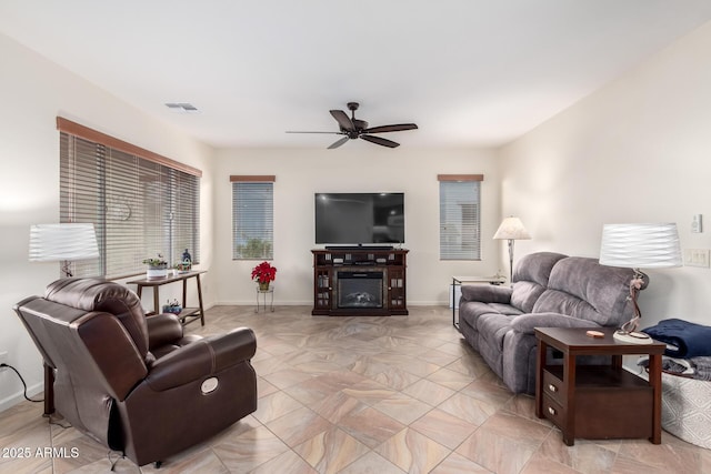 living room with ceiling fan