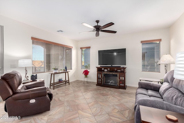 living room featuring ceiling fan