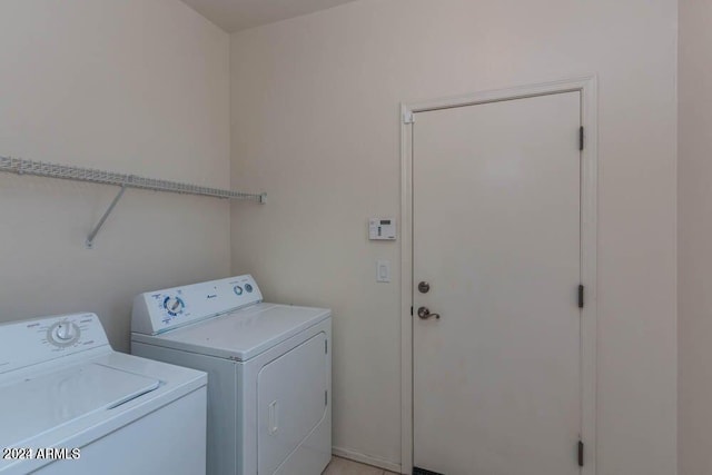 laundry area featuring separate washer and dryer