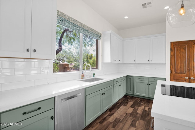 6310 E Dove Valley Rd, Cave Creek, AZ 85331 - kitchen with green cabinetry, dark wood-type flooring, light countertops, white cabinets, and dishwasher