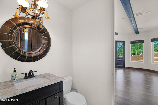 6310 E Dove Valley Rd, Cave Creek, AZ 85331 - bathroom featuring wood finished floors, a chandelier, and vanity