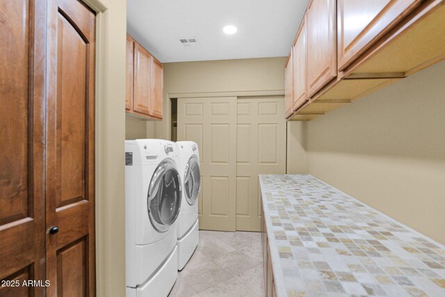 6310 E Dove Valley Rd, Cave Creek, AZ 85331 - laundry area with independent washer and dryer, cabinet space, recessed lighting, and light tile patterned flooring