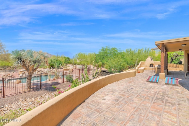 6310 E Dove Valley Rd, Cave Creek, AZ 85331 - view of patio featuring an outdoor fireplace