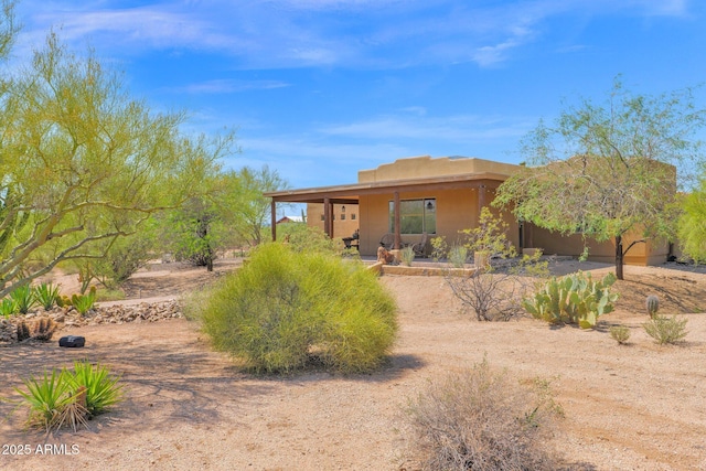 6310 E Dove Valley Rd, Cave Creek, AZ 85331 - rear view of property with stucco siding
