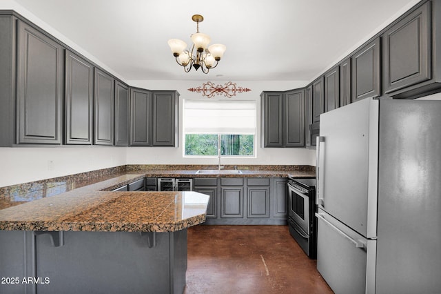 6310 E Dove Valley Rd, Cave Creek, AZ 85331 - kitchen with freestanding refrigerator, a peninsula, electric range, a chandelier, and concrete floors
