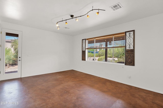 6310 E Dove Valley Rd, Cave Creek, AZ 85331 - unfurnished room with plenty of natural light and finished concrete floors