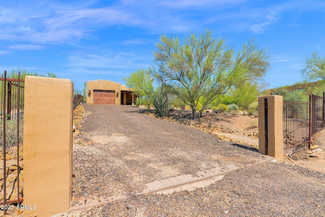 6310 E Dove Valley Rd, Cave Creek, AZ 85331 - view of front of house featuring a gate and stucco siding
