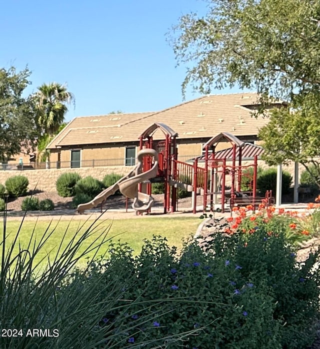 view of jungle gym with a yard