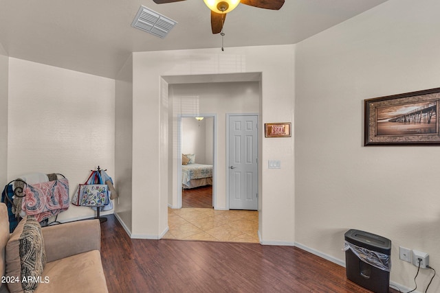 corridor with wood-type flooring