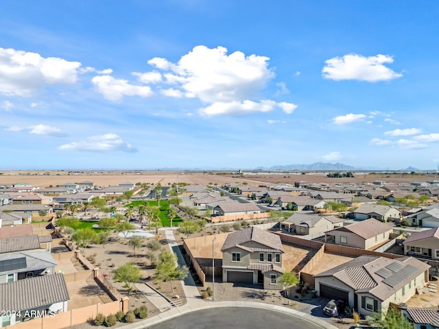 birds eye view of property with a residential view