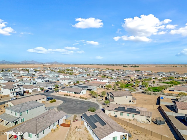 birds eye view of property with a residential view