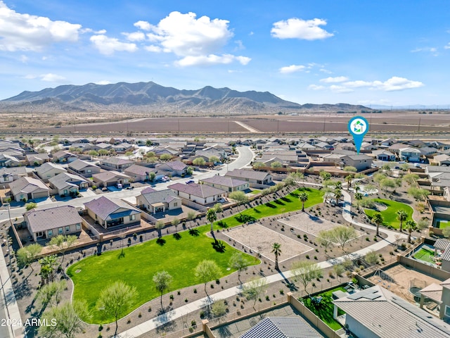 drone / aerial view with a residential view and a mountain view