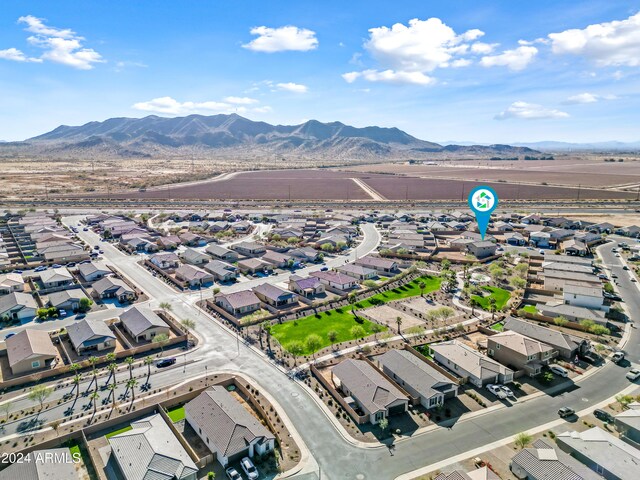 birds eye view of property with a residential view and a mountain view