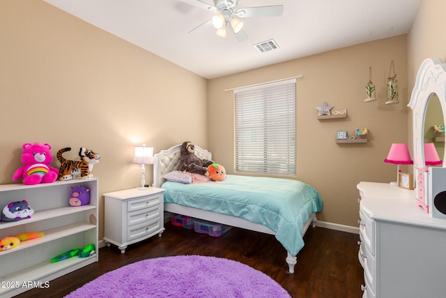 bedroom featuring dark hardwood / wood-style flooring and ceiling fan