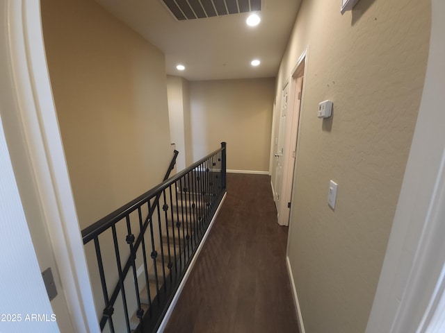 hallway with dark wood-type flooring