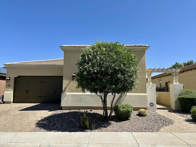562 E Vesper Trl, Queen Creek, AZ 85140 - view of front of house featuring stucco siding, an attached garage, decorative driveway, and a tiled roof