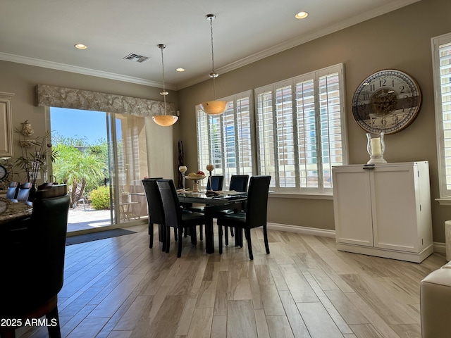 562 E Vesper Trl, Queen Creek, AZ 85140 - dining space with plenty of natural light, light wood-style floors, recessed lighting, baseboards, and ornamental molding