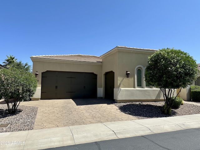 562 E Vesper Trl, Queen Creek, AZ 85140 - view of front of house featuring stucco siding, a garage, decorative driveway, and a tile roof