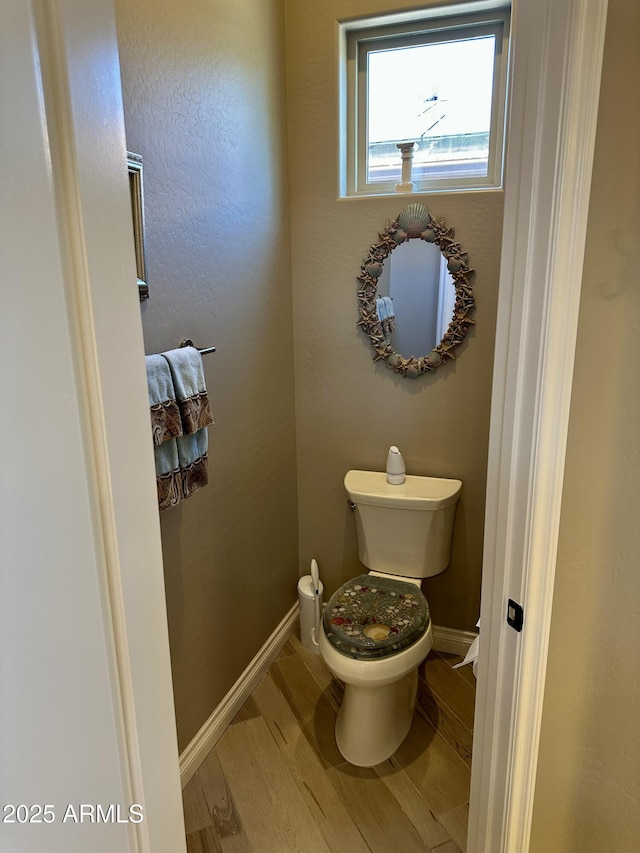 562 E Vesper Trl, Queen Creek, AZ 85140 - bathroom with toilet, wood finished floors, and baseboards