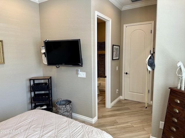 562 E Vesper Trl, Queen Creek, AZ 85140 - bedroom featuring crown molding, light wood-type flooring, and baseboards