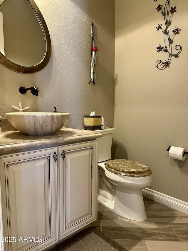 562 E Vesper Trl, Queen Creek, AZ 85140 - half bath with toilet, vanity, and baseboards